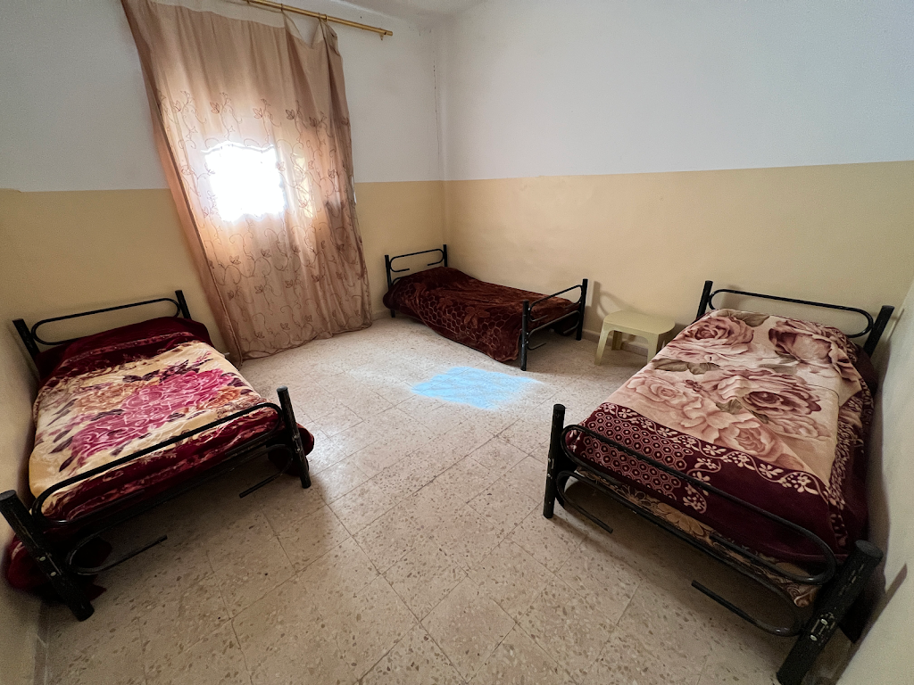 Hostel bedroom with mountain view